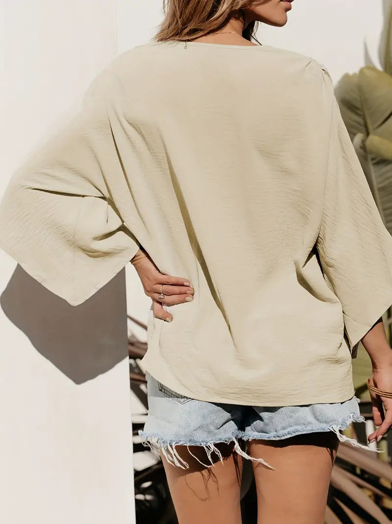 Oversized damesblouse met V-hals