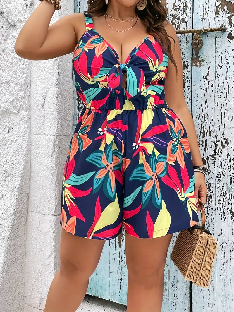 Plus size jumpsuit met tropische bloemenprint, halfopen rug en strik ter hoogte van de borst