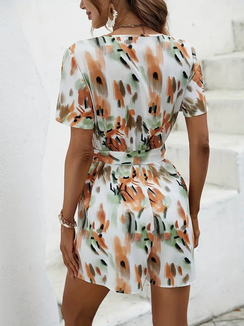 Luchtige jumpsuit met eigentijdse all-over print, V-hals en taillelus