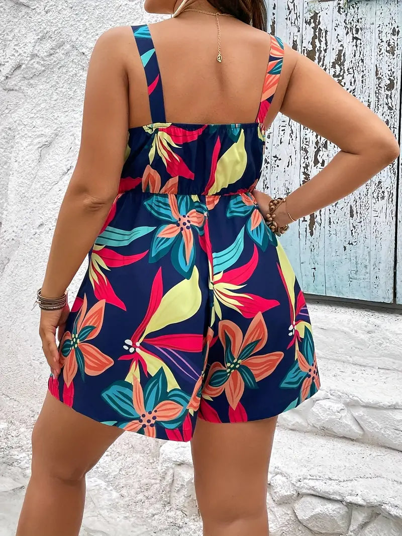 Plus size jumpsuit met tropische bloemenprint, halfopen rug en strik ter hoogte van de borst