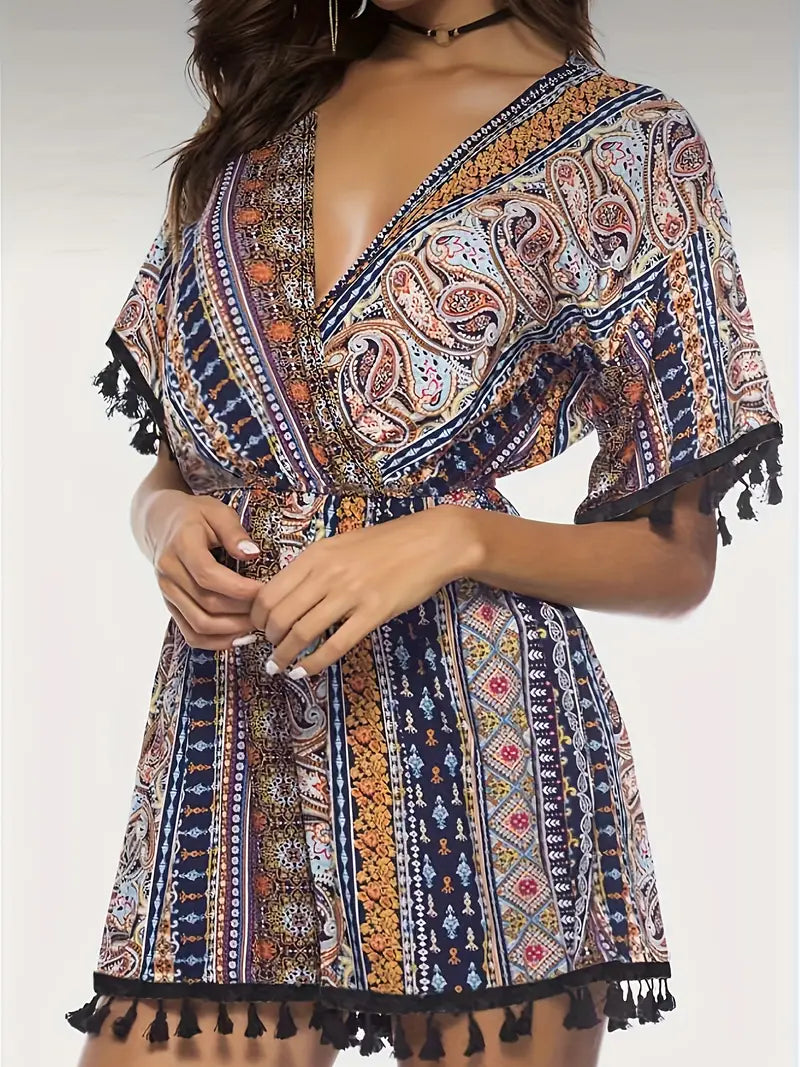 Bohemian style jumpsuit met diepgaande V-hals en kwastjes ter afwerking