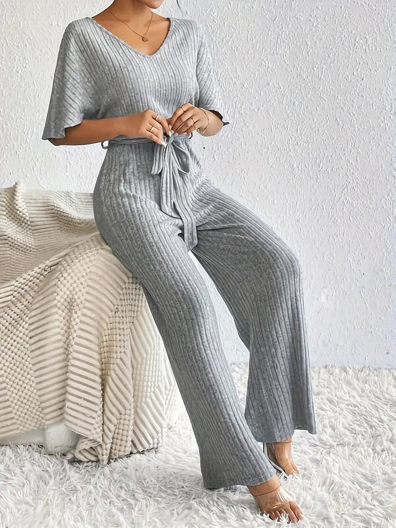 Comfortabele stoffen jumpsuit met V-hals en losse mouwen