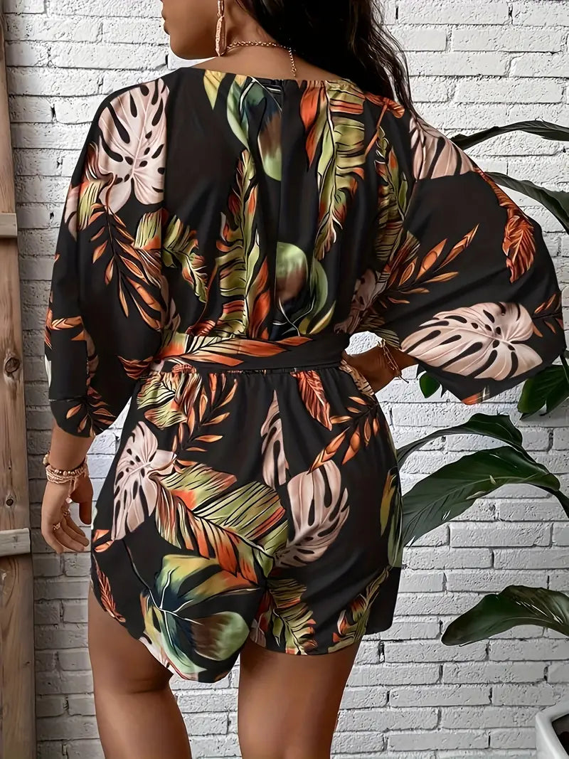 Plus size jumpsuit met bladerprint, tailleband en middellange losse mouwen