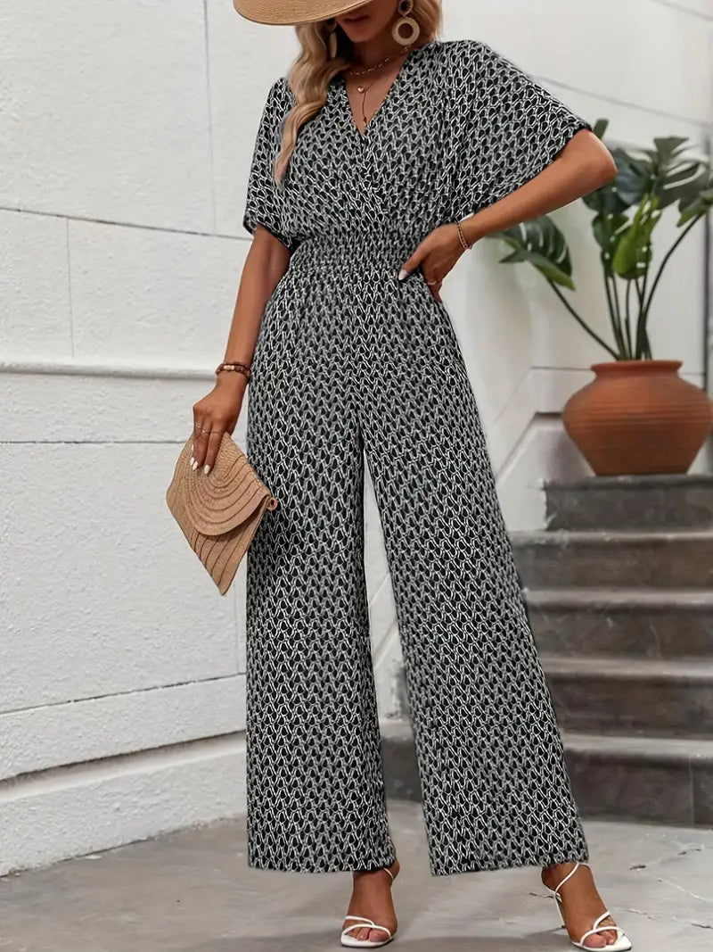 Jumpsuit met V-hals, wijde broekspijpen en moderne print